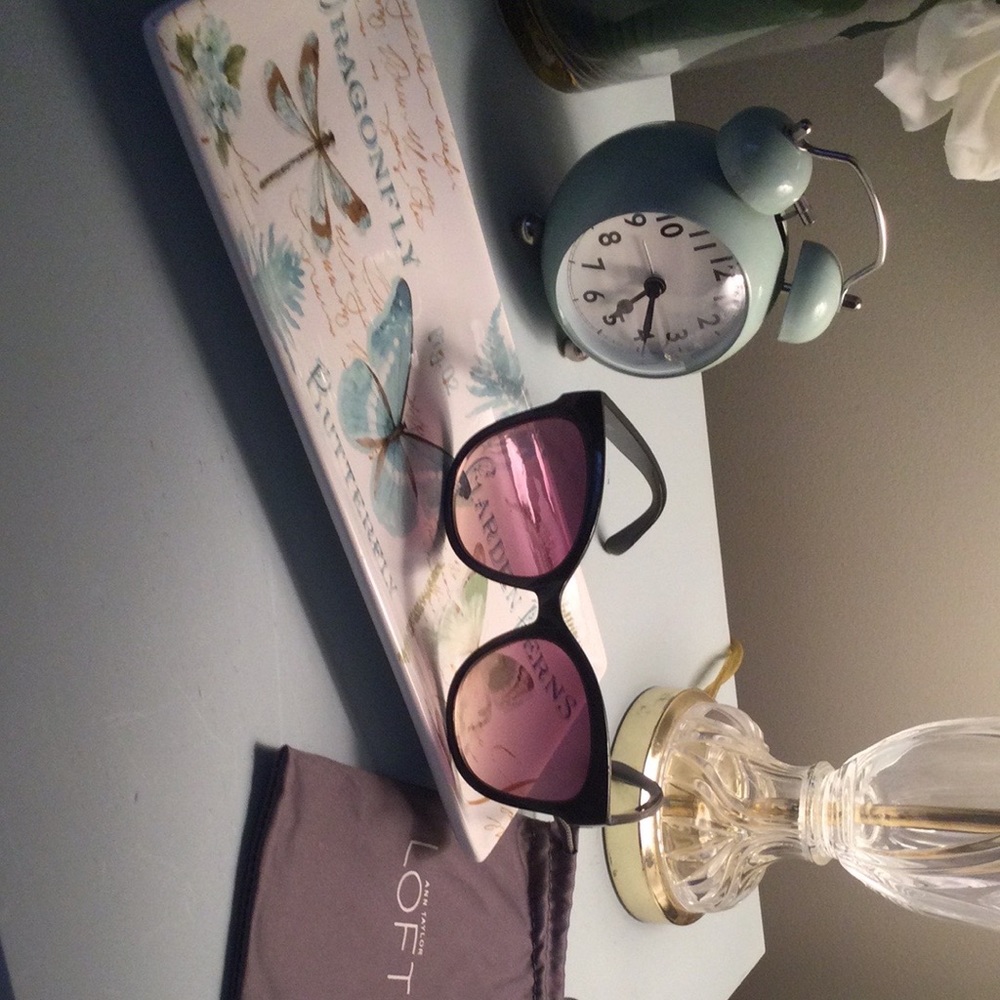 Oversized black Loft sunglasses.  Excellent condition.  Cloth case included.